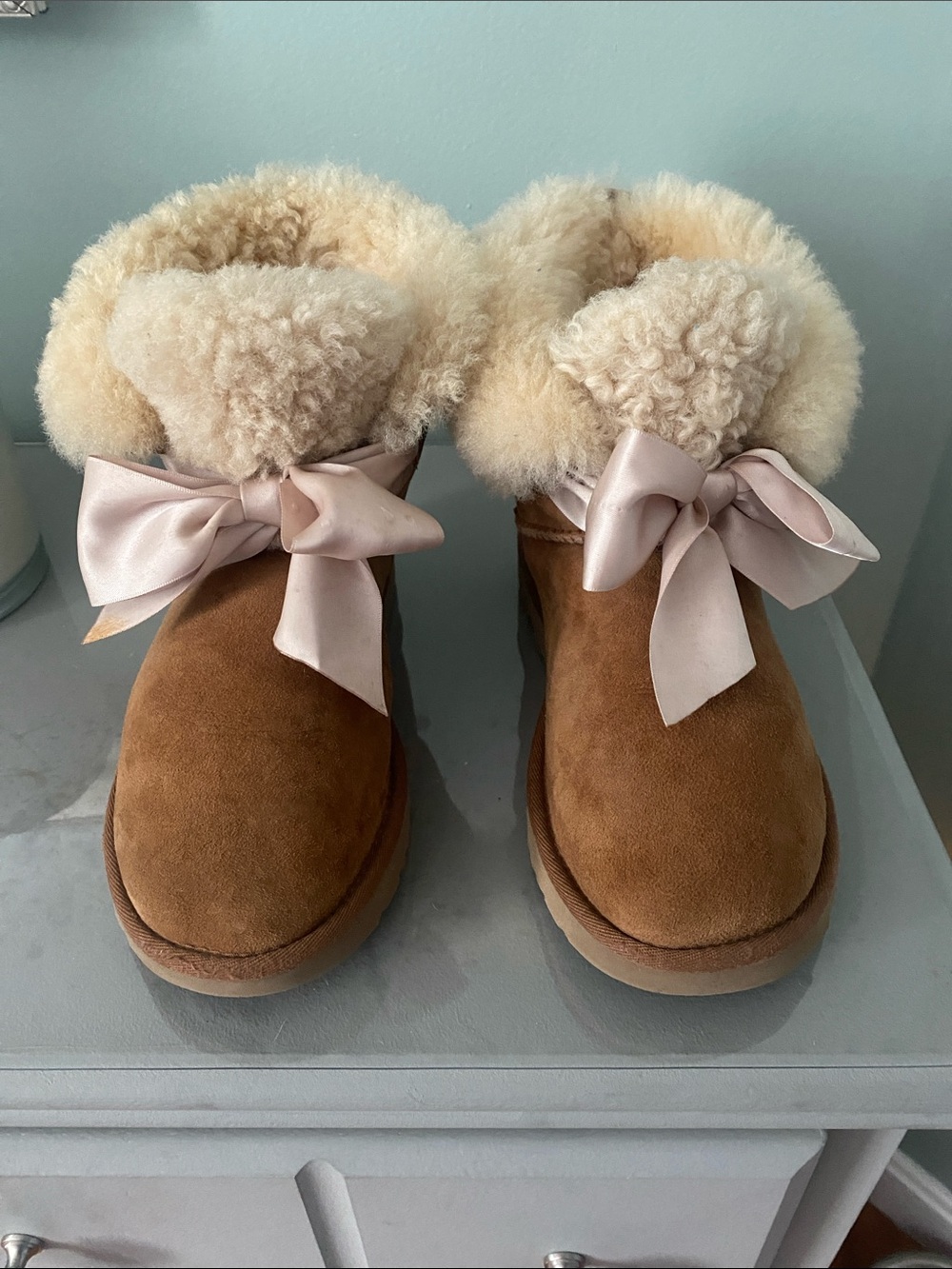 UGG Chestnut Suede Ankle Boots with Cream Shearling and Pink Satin Bows